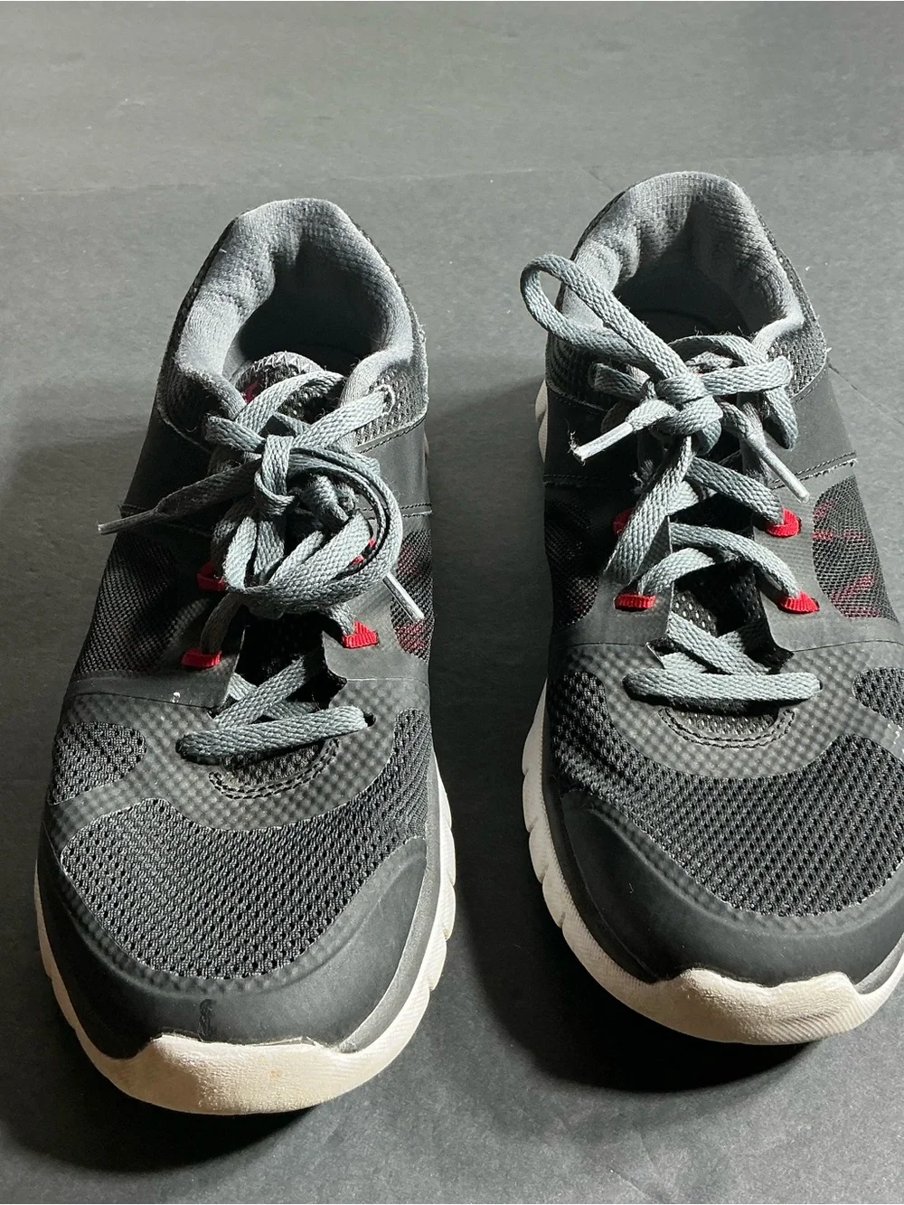Youth black Athletic Sneakers with Red Accents